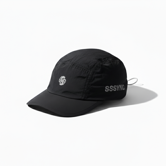 Black cap with brand logo on a white background running cap