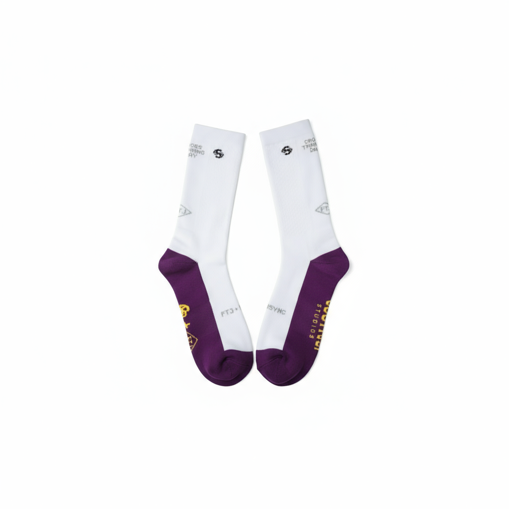 White socks with purple toes and heels on a white background running socks