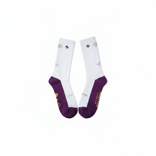 White socks with purple toes and heels on a white background running socks