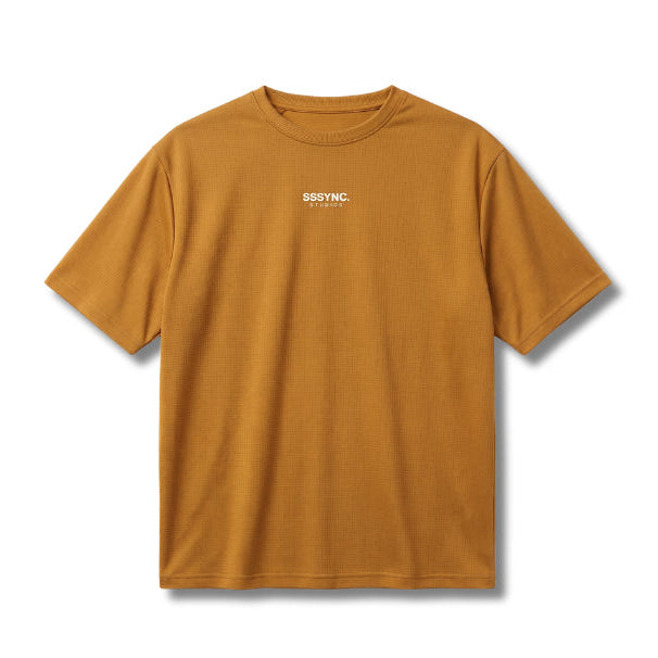 A mustard yellow short-sleeve t-shirt with a small white '566STNC' logo printed on the center chest, displayed flat against a clean white background.